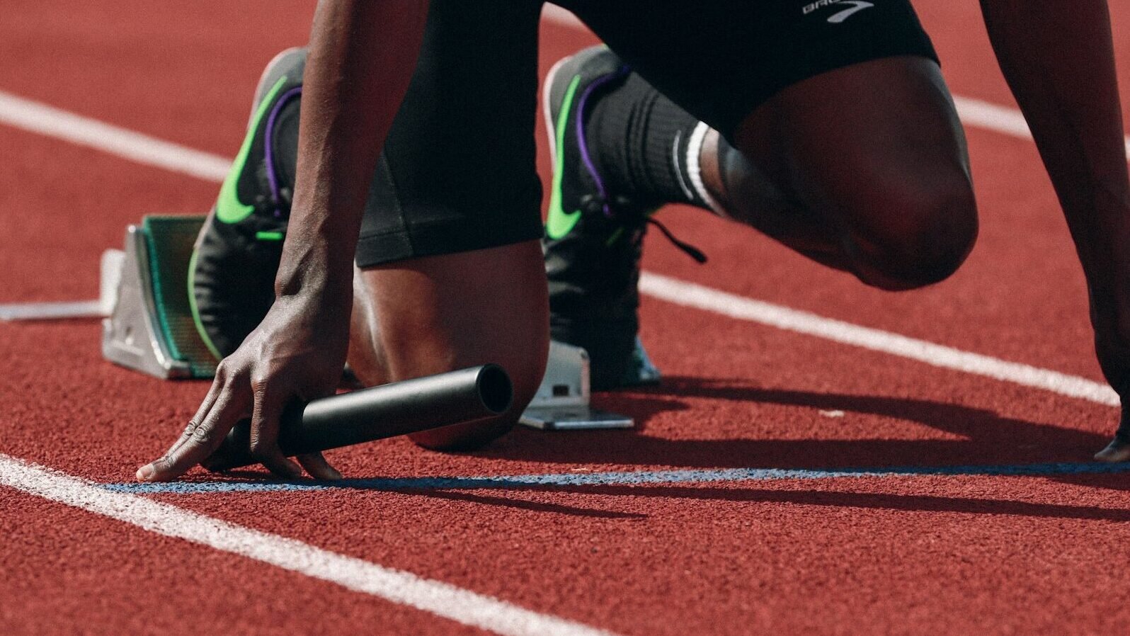 man on running field