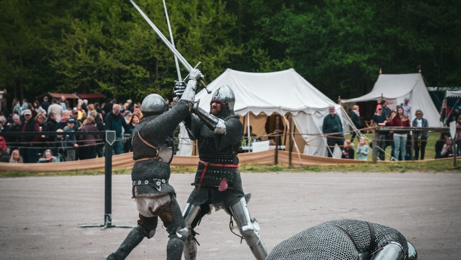 men fighting with sword